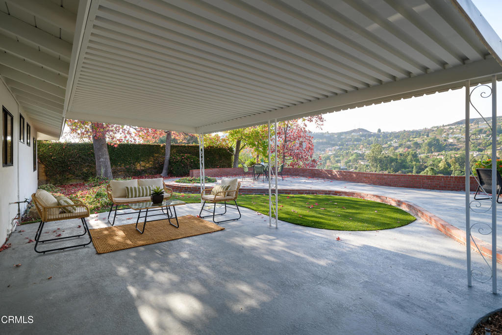 3514 St Elizabeth Road Glendale, CA 91206 - Photo 33 of 75 a view of a swimming pool with a patio