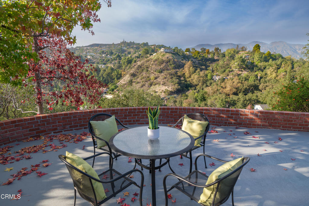 3514 St Elizabeth Road Glendale, CA 91206 - Photo 40 of 75 a balcony with table and chairs