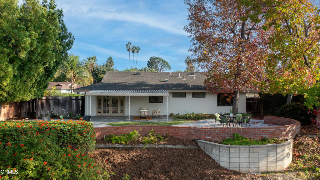 3514 St Elizabeth Road Glendale, CA 91206 - Photo 46 of 75 a front view of a house with fountain and outdoor seating