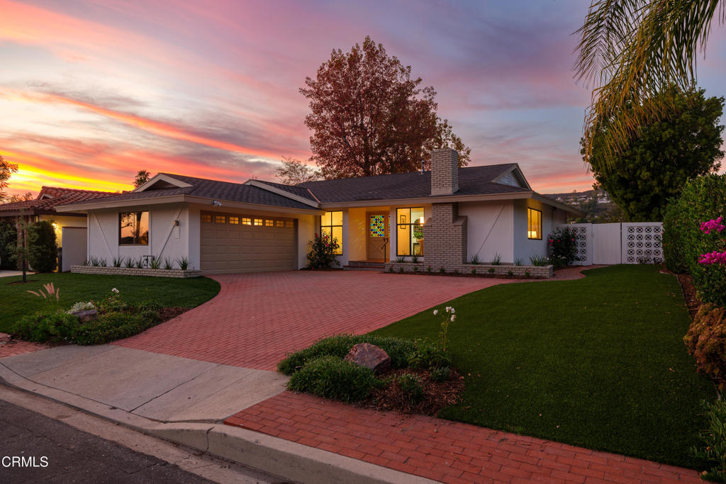 3514 St Elizabeth Road Glendale, CA 91206 - Photo 66 of 75 a front view of a house with a garden and yard