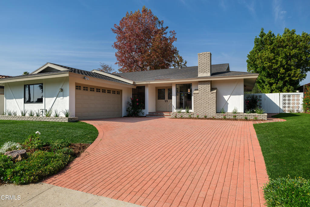 3514 St Elizabeth Road Glendale, CA 91206 - Photo 67 of 75 a front view of a house with a garden and plants
