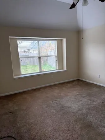 an empty room with a window