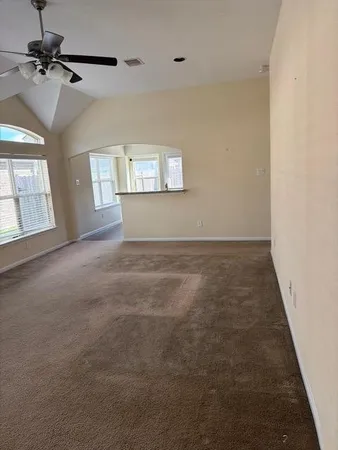 an empty room with windows