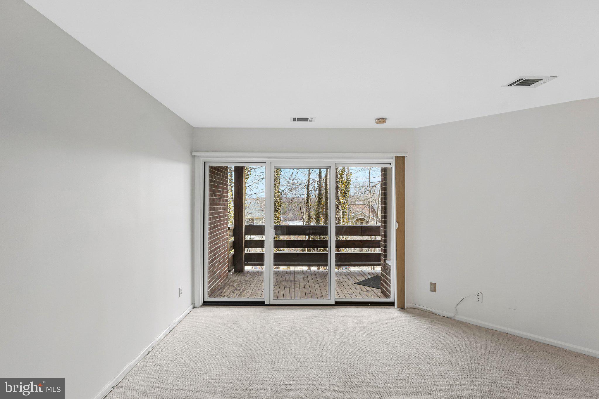 11144 Beaver Trail Court, Unit 11144 Reston, VA 20191 - Photo 18 of 24 Sliding glass doors to balcony