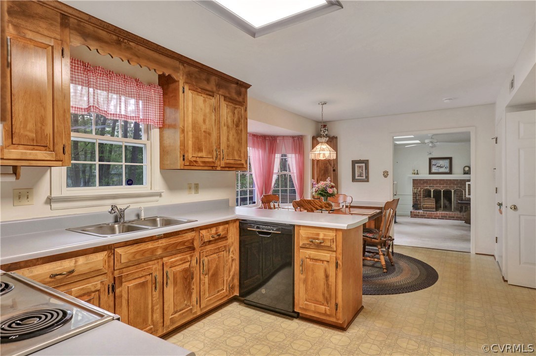 6201 Lansgate Road Midlothian, VA 23112 - Photo 11 of 31 a kitchen with a sink stove and cabinets