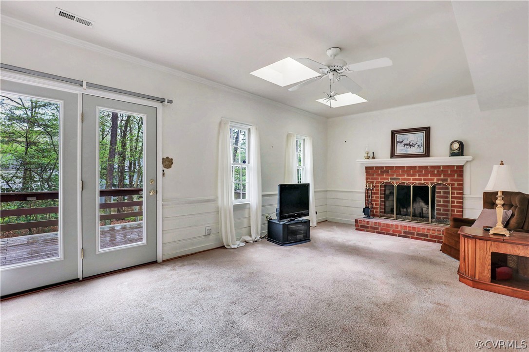 6201 Lansgate Road Midlothian, VA 23112 - Photo 16 of 31 a view of an empty room with fireplace and a window