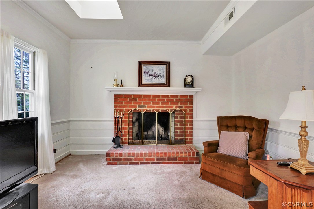 6201 Lansgate Road Midlothian, VA 23112 - Photo 17 of 31 a living room with furniture and a fireplace