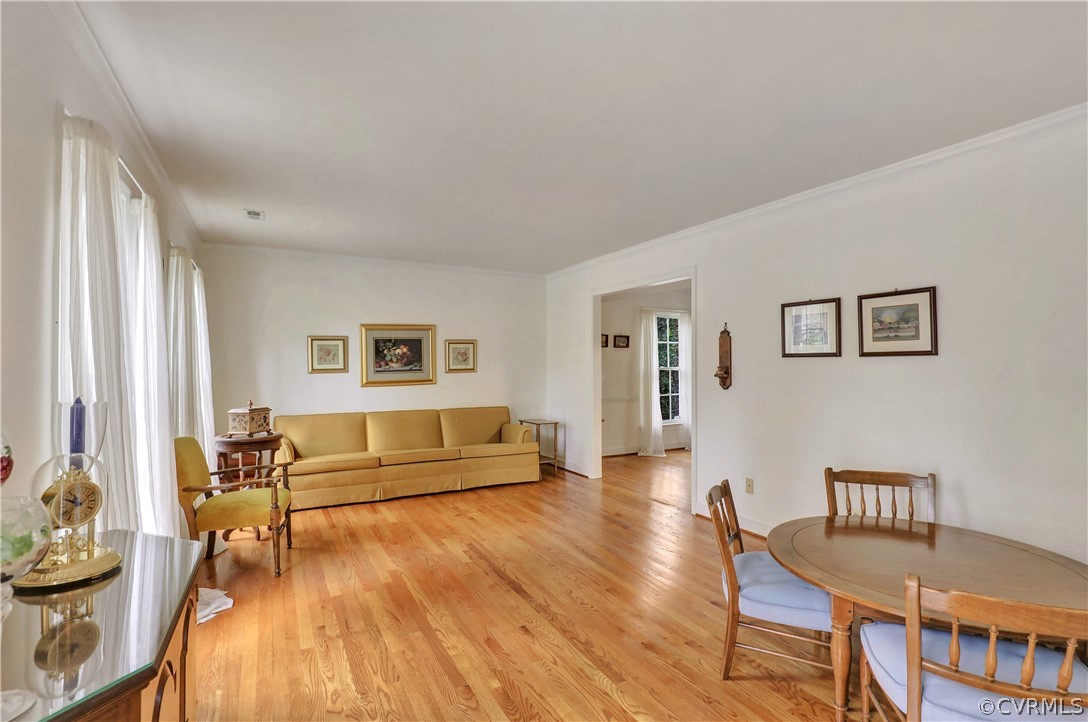 6201 Lansgate Road Midlothian, VA 23112 - Photo 3 of 31 a living room with furniture and a wooden floor