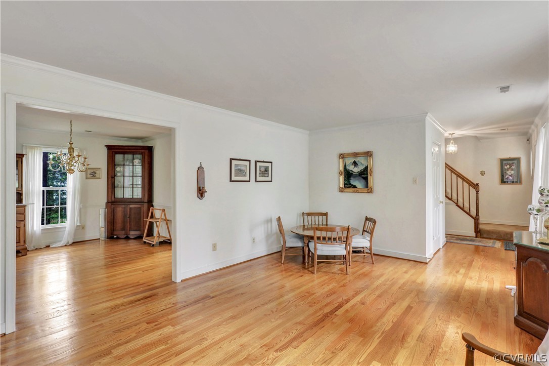 6201 Lansgate Road Midlothian, VA 23112 - Photo 5 of 31 a view of a livingroom with furniture and wooden floor