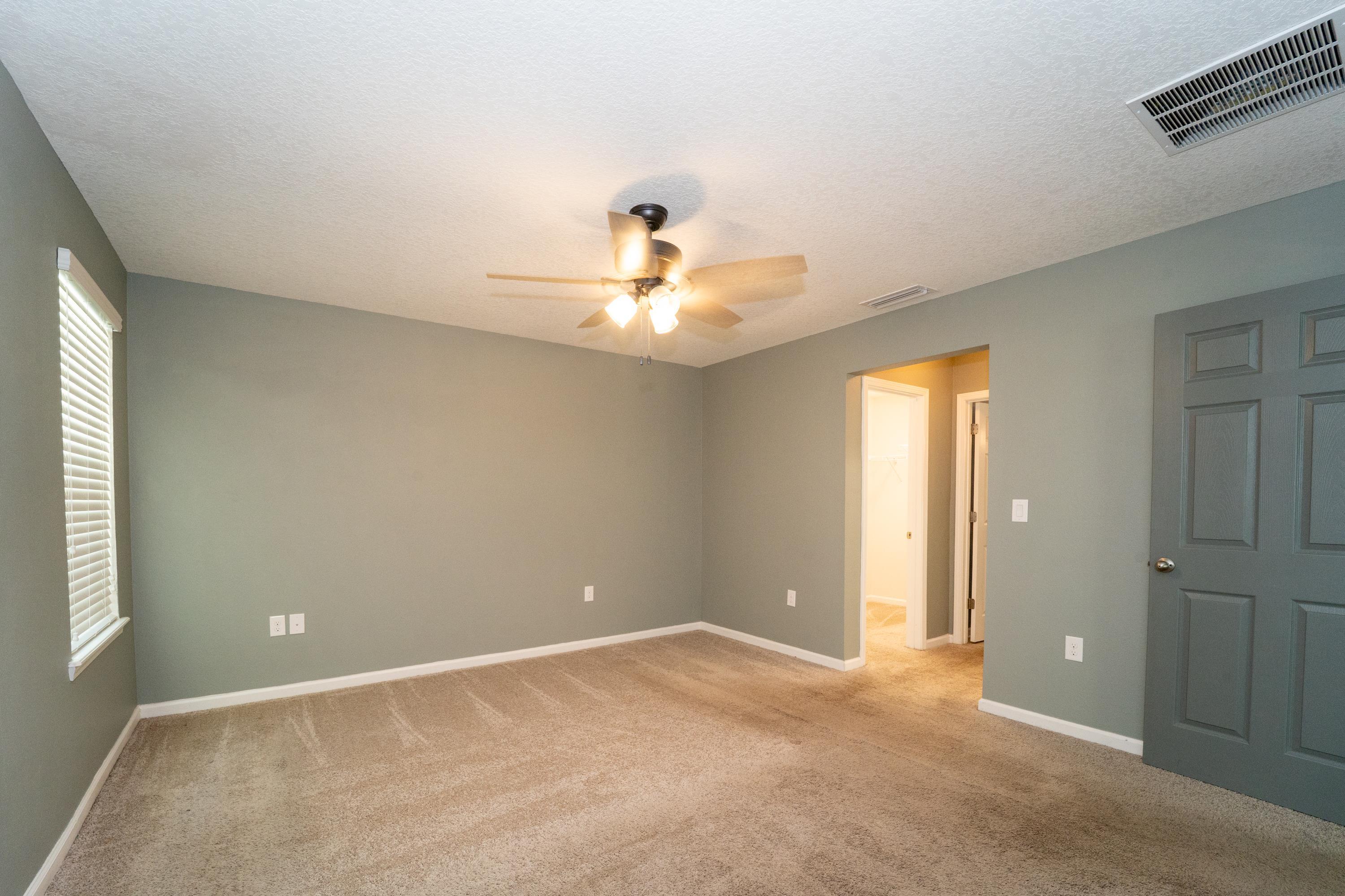 415 Santorini Court St. Augustine, FL 32086 - Photo 13 of 52 a view of a livingroom with a sink and a window