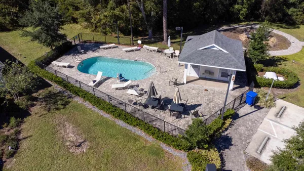 a view of a swimming pool with an outdoor space