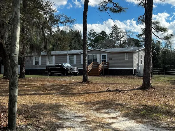 a view of a house with a patio