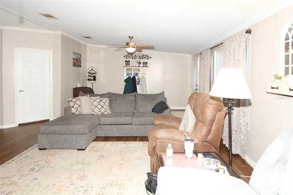 a view of a workspace with furniture