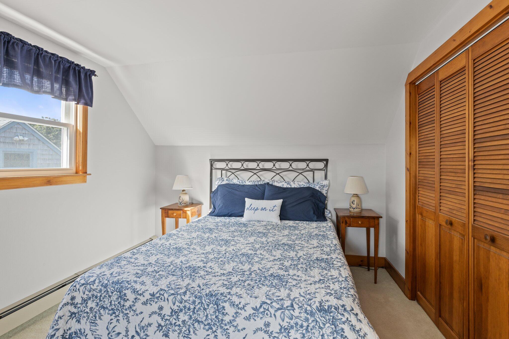 176 Maple Street West Barnstable, MA 02668 - Photo 29 of 83 a bedroom with a bed and wooden floor