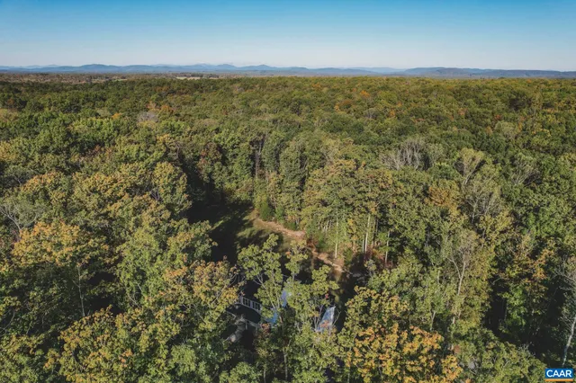 a view of an ocean and mountain