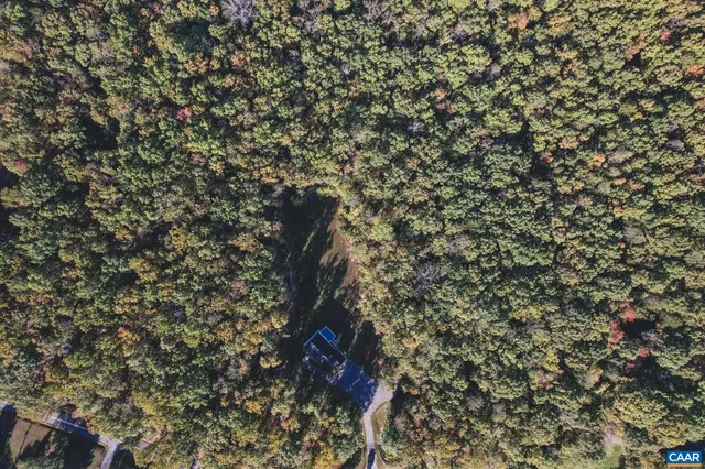 a view of deck and a backyard