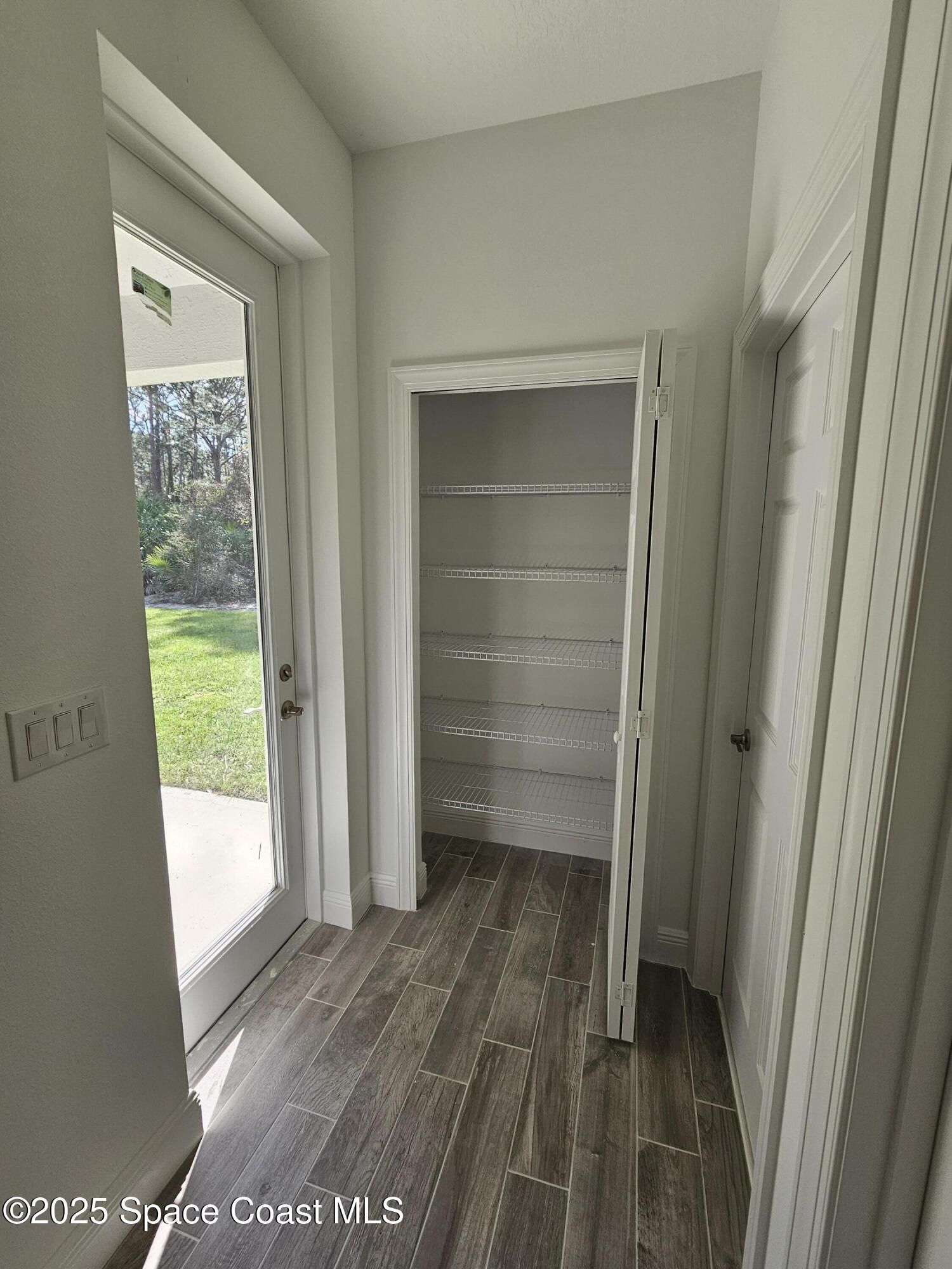 1312 Saxony Road Southwest Palm Bay, FL 32908 - Photo 27 of 52 Linen Closet