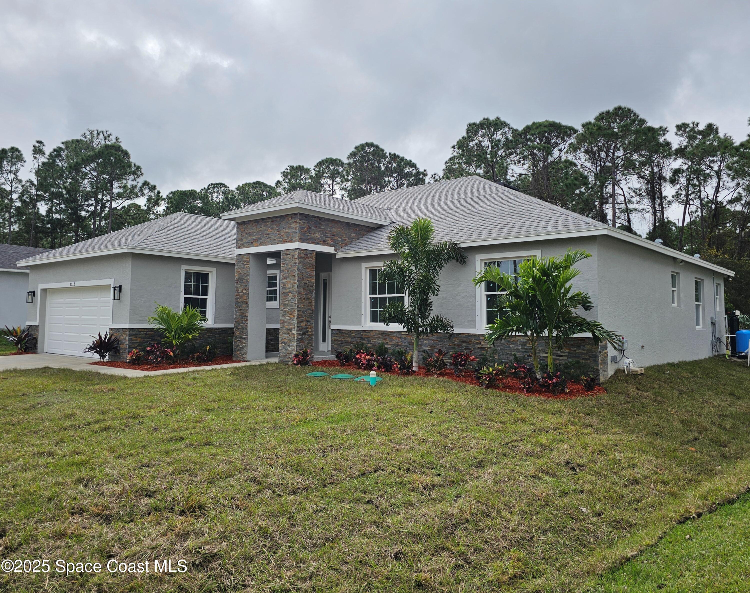 1312 Saxony Road Southwest Palm Bay, FL 32908 - Photo 3 of 52 5 (2)