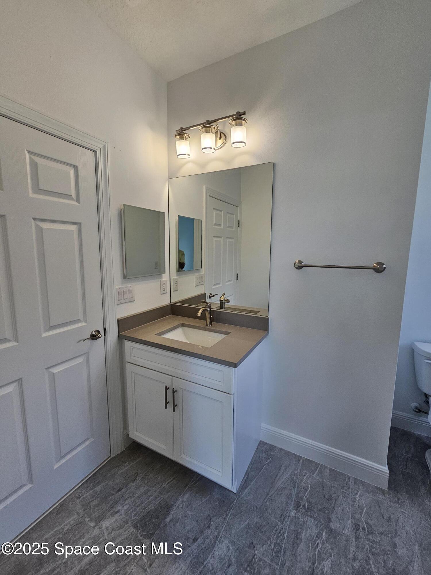 1312 Saxony Road Southwest Palm Bay, FL 32908 - Photo 35 of 52 Bathroom 3-2
