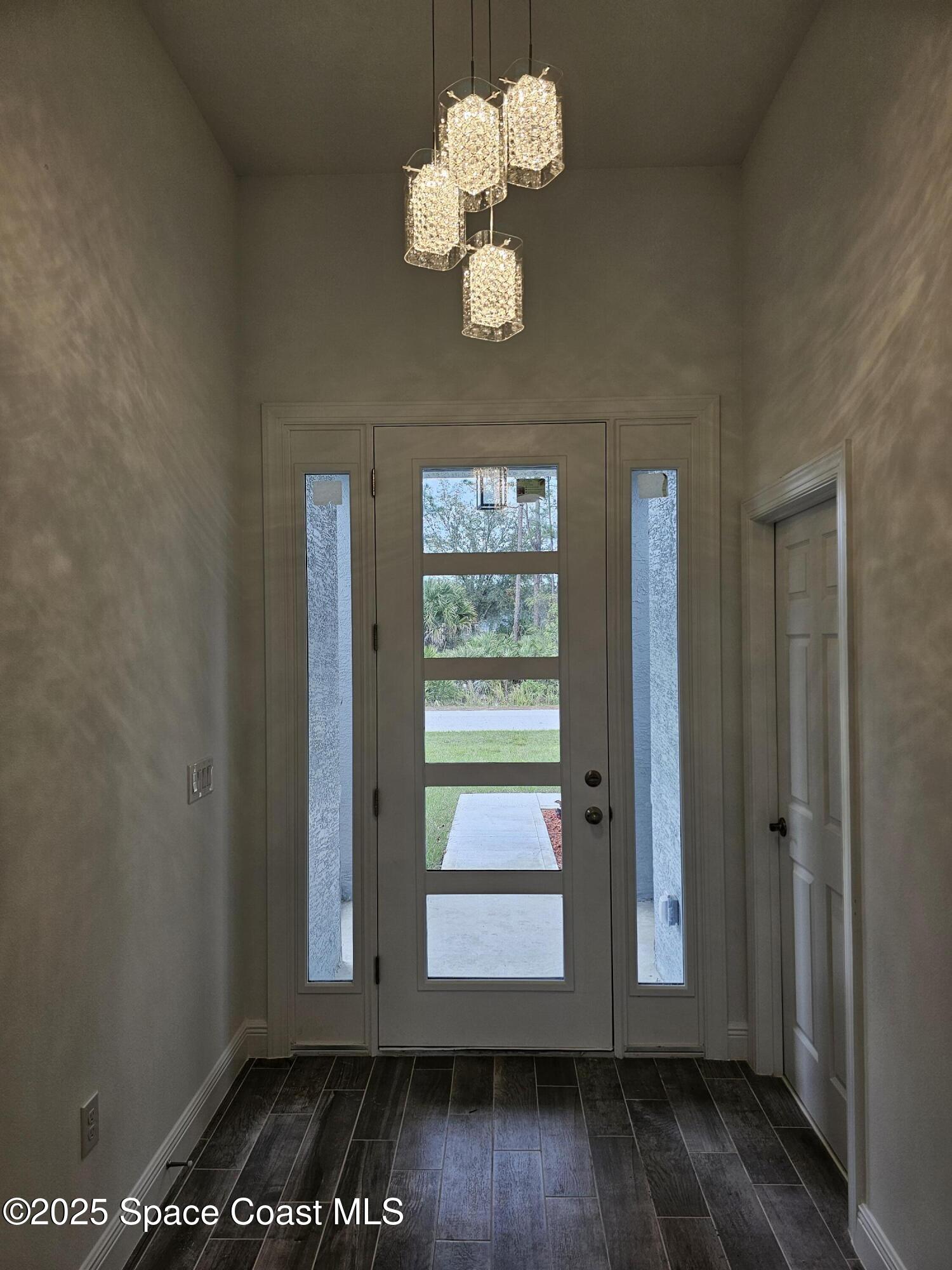 1312 Saxony Road Southwest Palm Bay, FL 32908 - Photo 6 of 52 Foyer 1