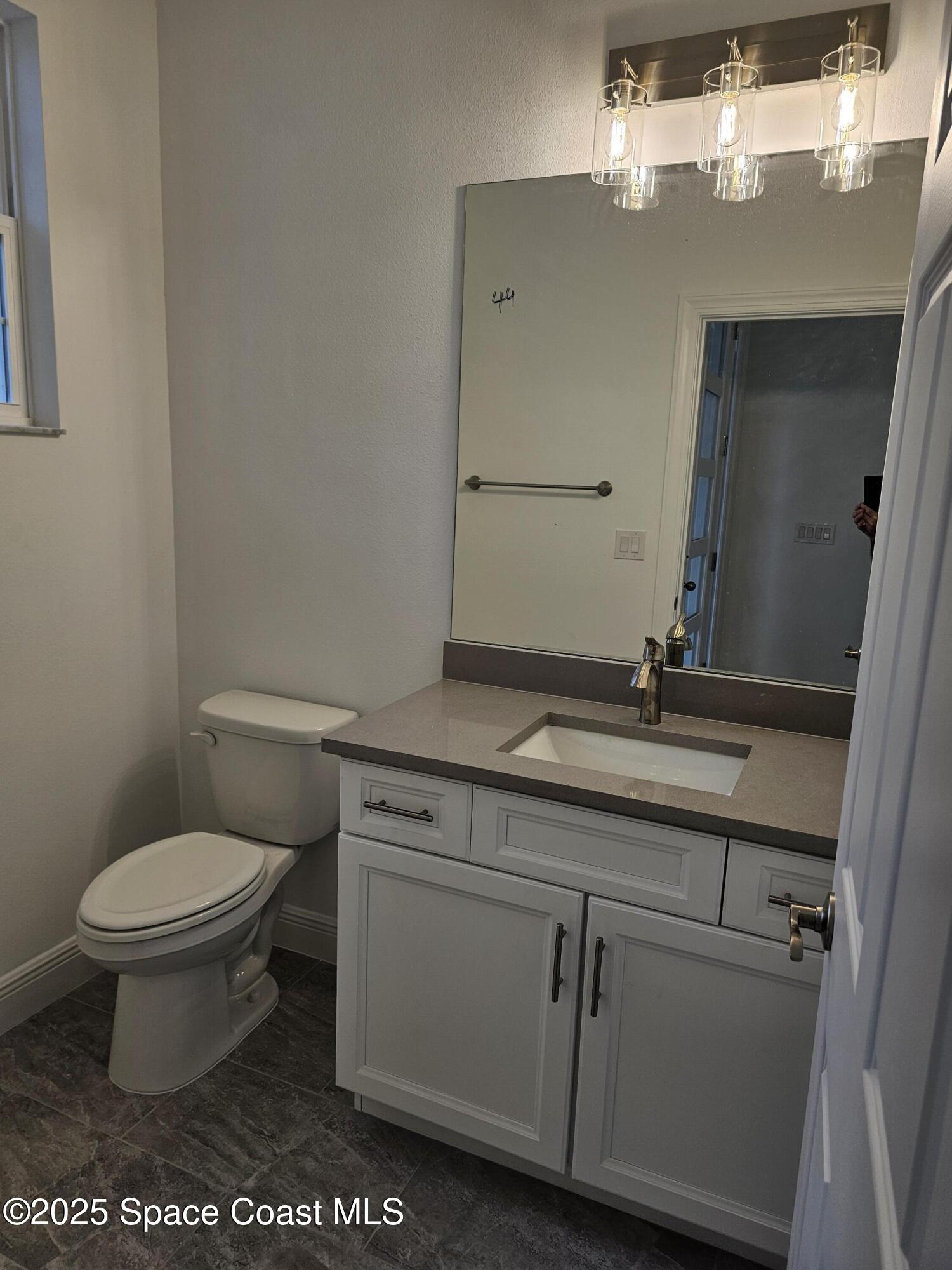 1312 Saxony Road Southwest Palm Bay, FL 32908 - Photo 8 of 52 Half Bath 1
