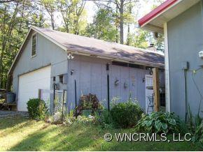 130 Bradshaw Road Tryon, NC 28782 - Photo 12 of 16 a view of a house with a yard