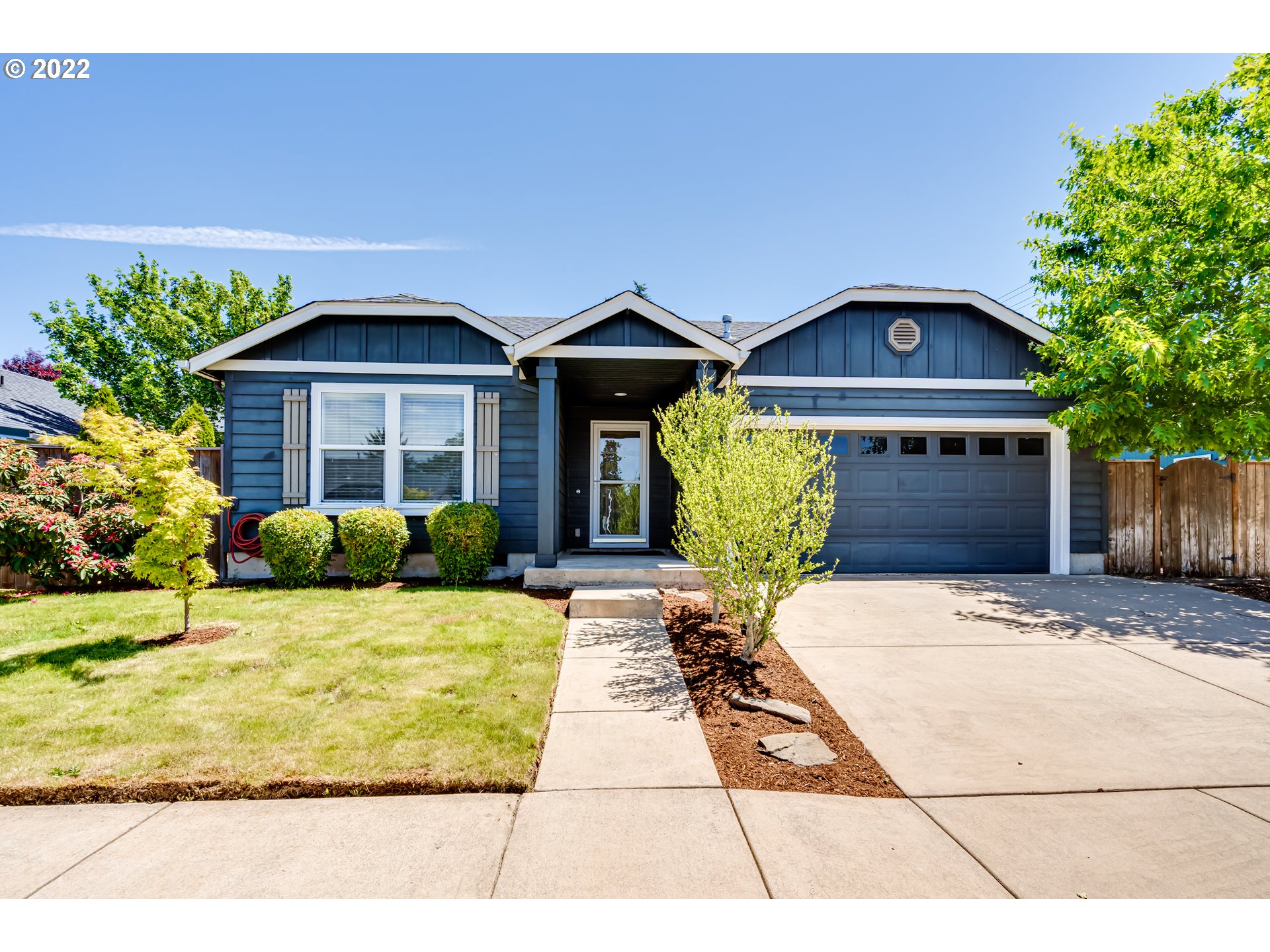 569 South 48th Street Springfield, OR 97478 - Photo 1 of 23 a view of a house with a yard
