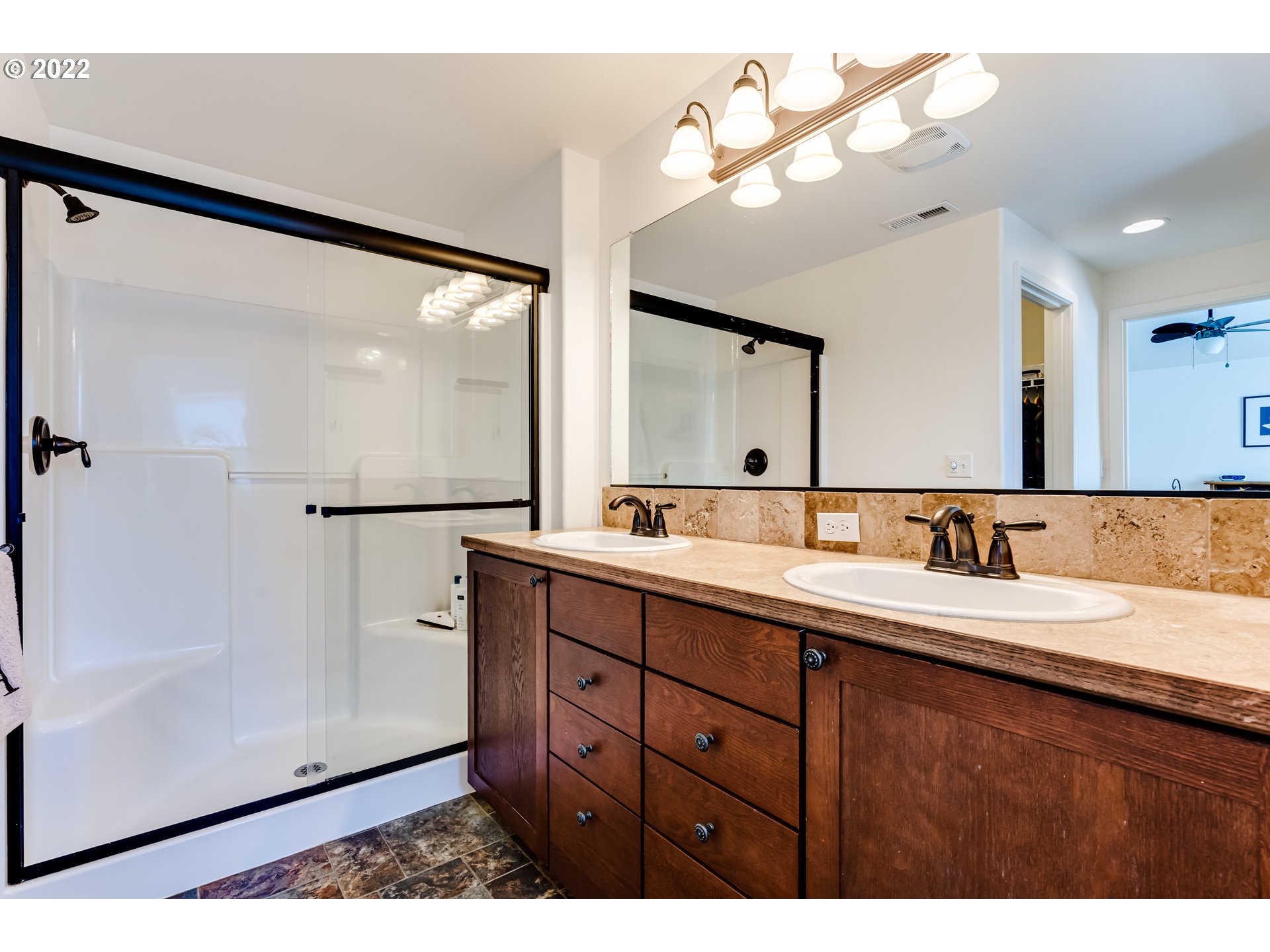 569 South 48th Street Springfield, OR 97478 - Photo 20 of 23 a bathroom with a double vanity sink and a mirror
