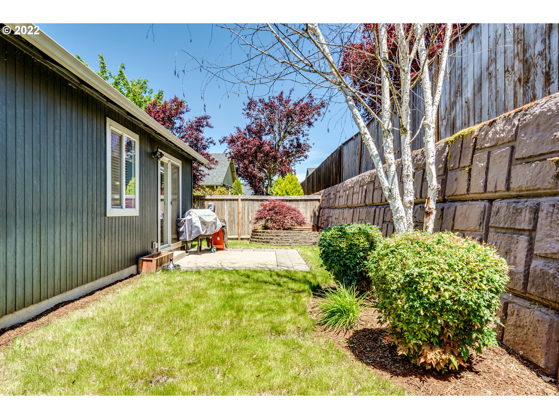 569 South 48th Street Springfield, OR 97478 - Photo 21 of 23 a front view of a house with a yard