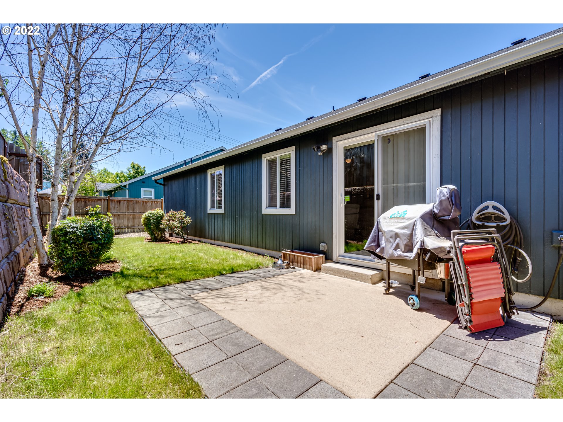 569 South 48th Street Springfield, OR 97478 - Photo 23 of 23 a backyard of a house with yard and outdoor seating