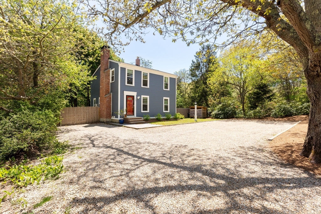 1020 Old Falmouth Road Barnstable, MA 02632 - Photo 5 of 42 a view of backyard of the house