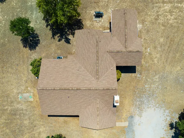 a house with trees in front of it