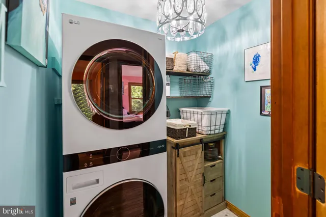 a view of livingroom with washer and dryer