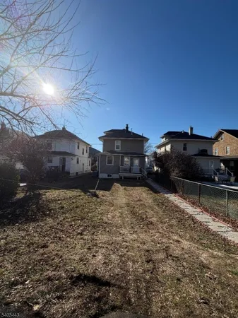 a car parked in front of a house