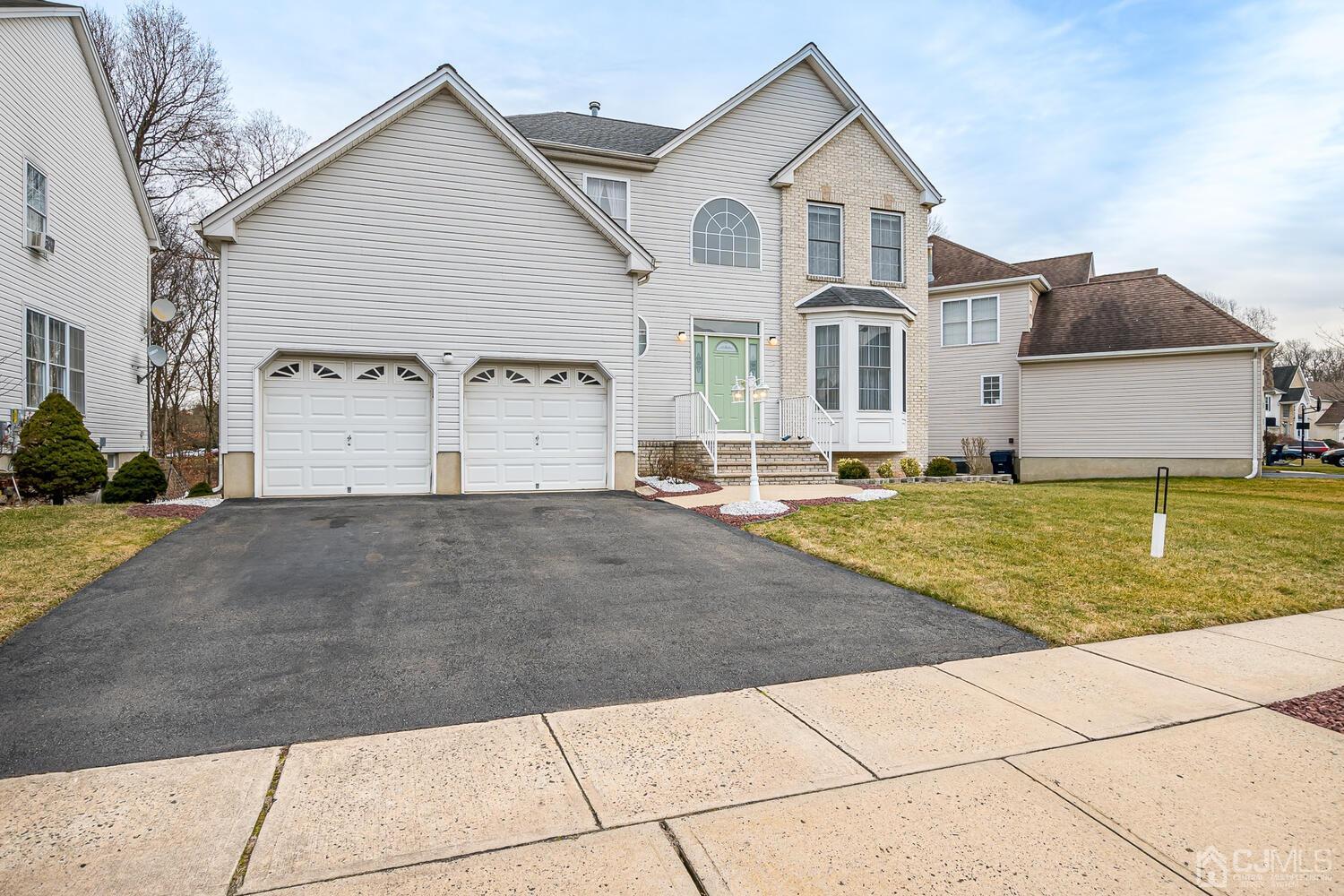 22 Timber Ridge Road North Brunswick, NJ 08902 - Photo 2 of 50 a view of a house with a yard
