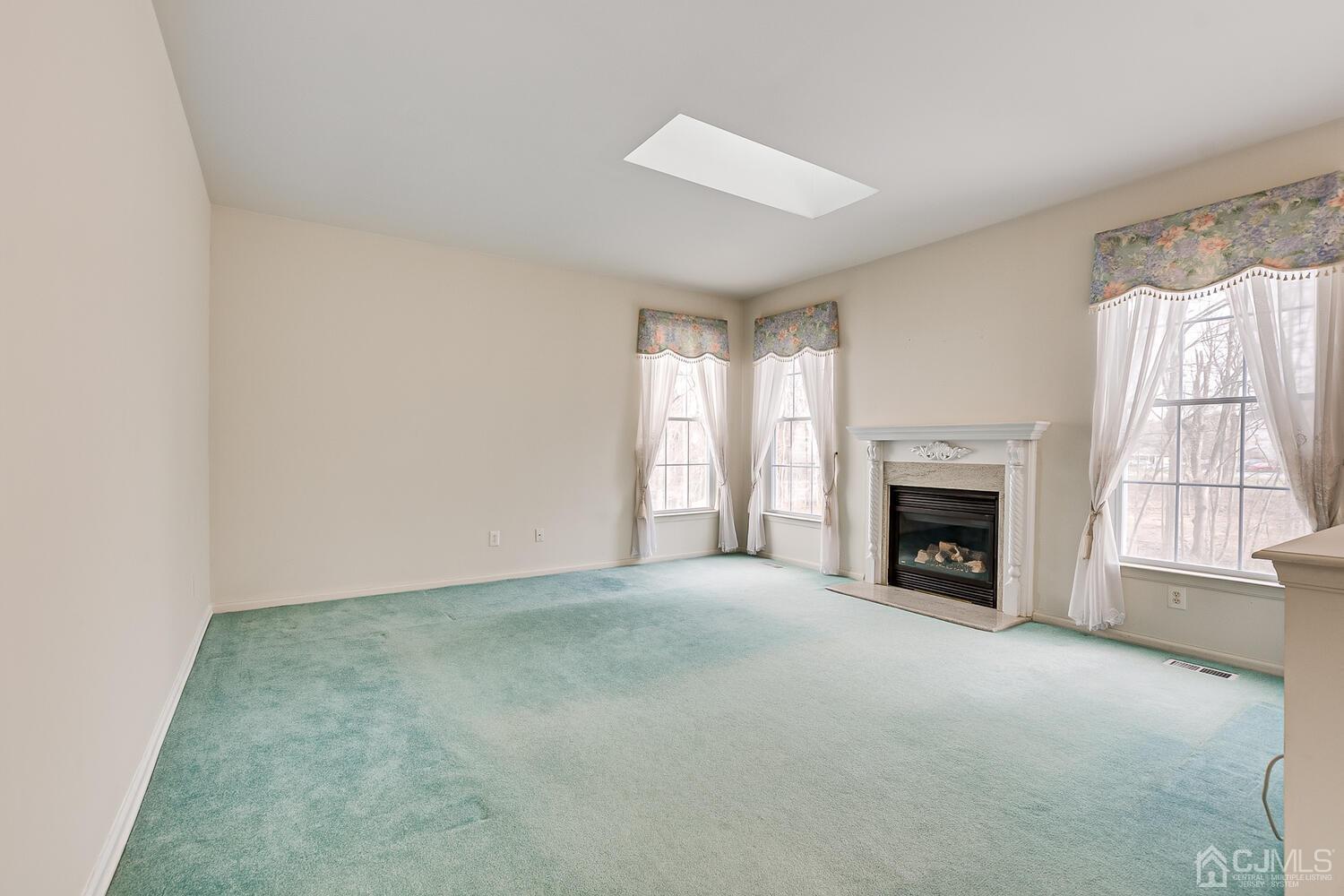 22 Timber Ridge Road North Brunswick, NJ 08902 - Photo 22 of 50 a view of empty room with a fireplace