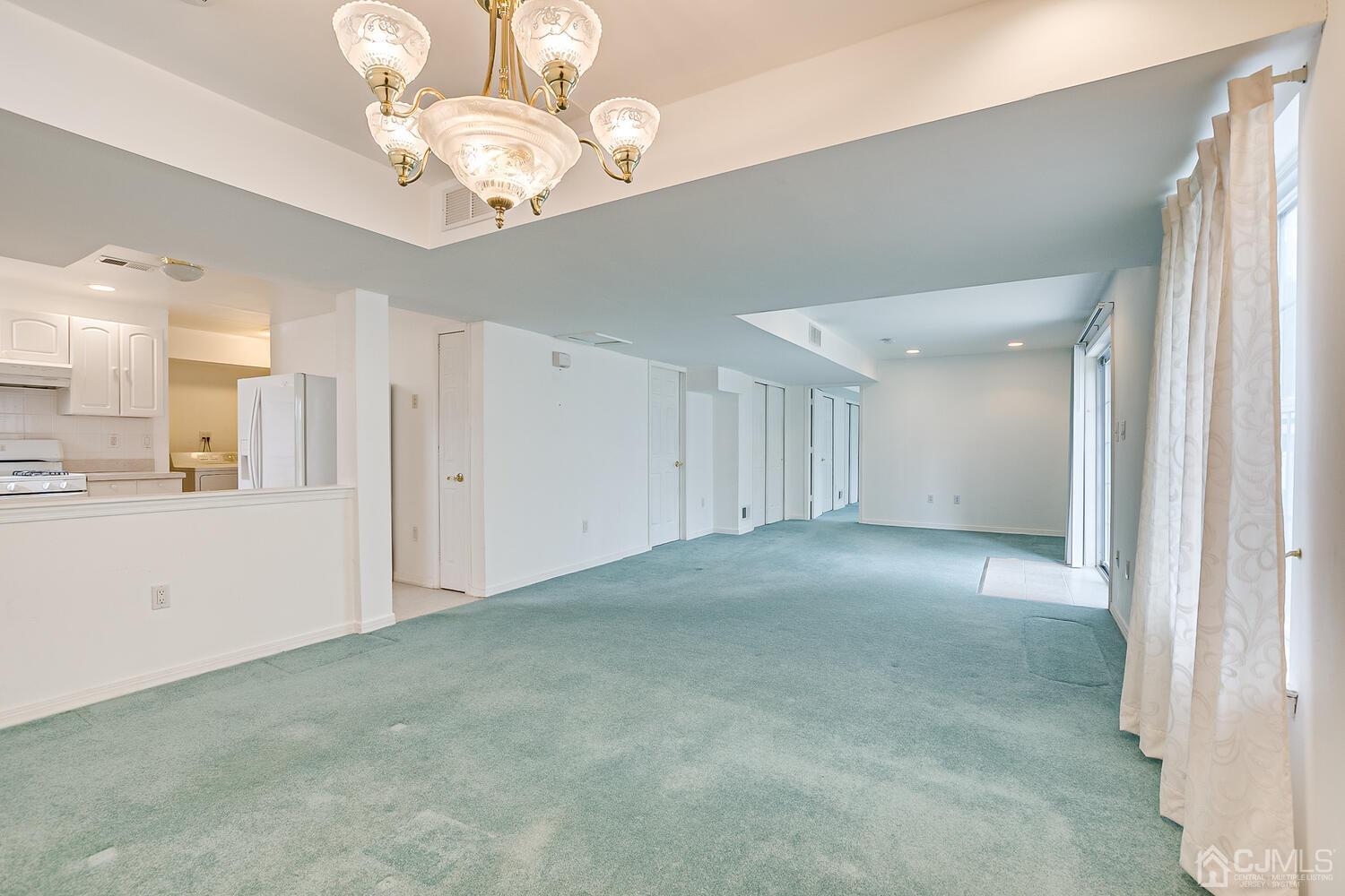 22 Timber Ridge Road North Brunswick, NJ 08902 - Photo 41 of 50 a view of a chandelier in a room
