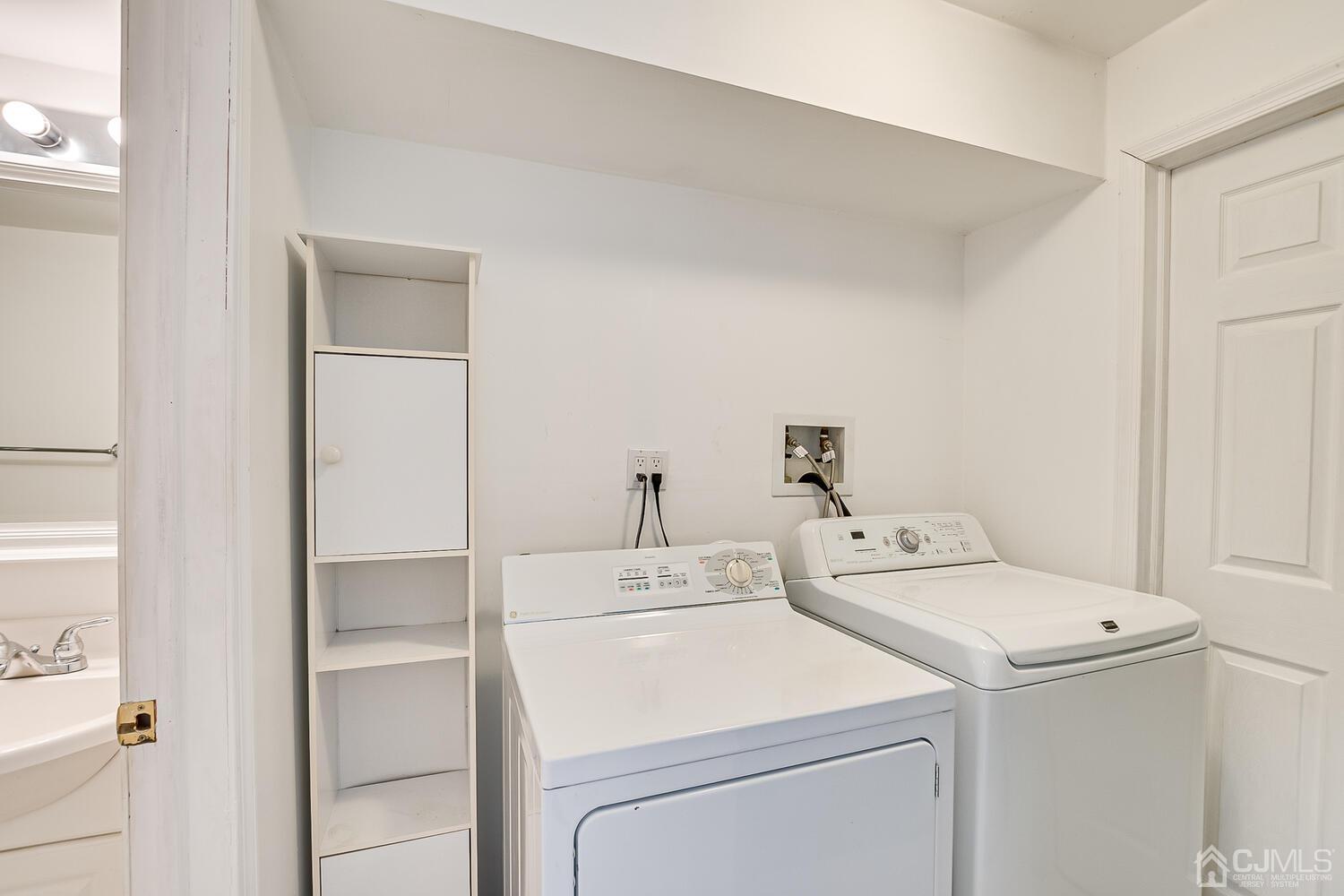 22 Timber Ridge Road North Brunswick, NJ 08902 - Photo 48 of 50 a utility room with dryer and washer