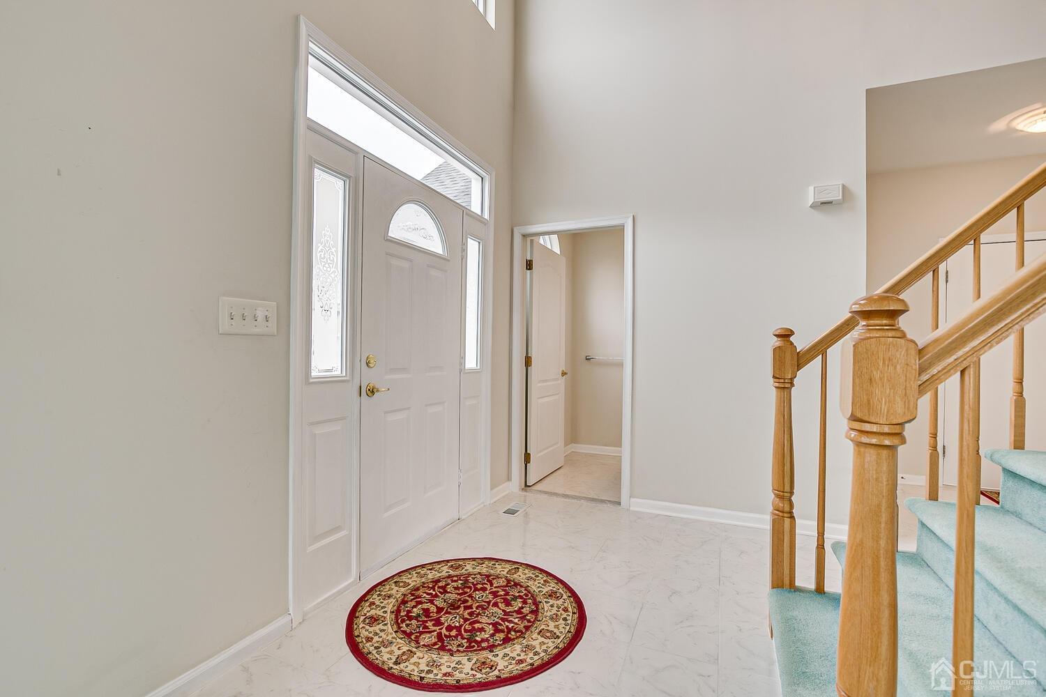 22 Timber Ridge Road North Brunswick, NJ 08902 - Photo 5 of 50 a view of an entryway with wooden floor