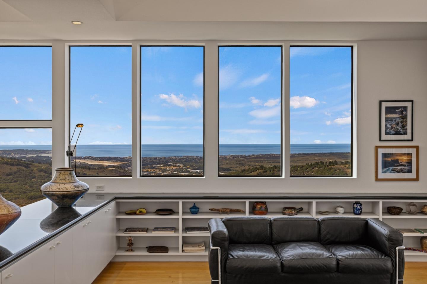 a view of a living room with a large window