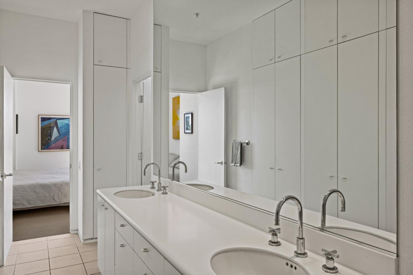 10450 Saddle Road Monterey, CA 93940 - Photo 38 of 49 a bathroom with double vanity sink and a mirror