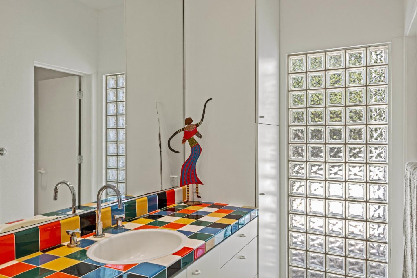 10450 Saddle Road Monterey, CA 93940 - Photo 44 of 49 a bathroom with a sink and a mirror