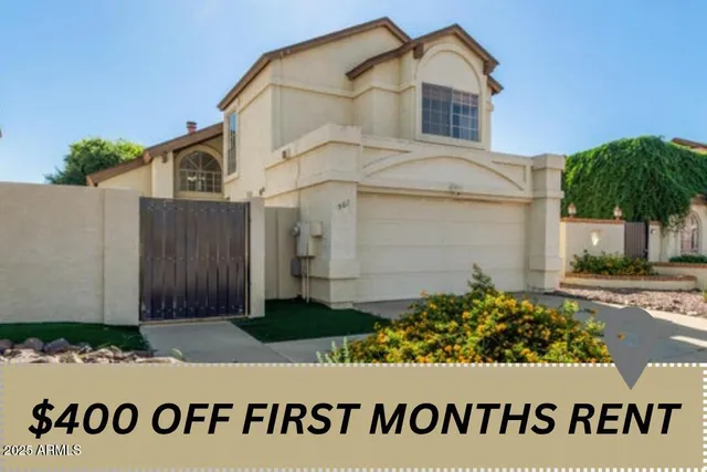 a view of a white house with sign broad