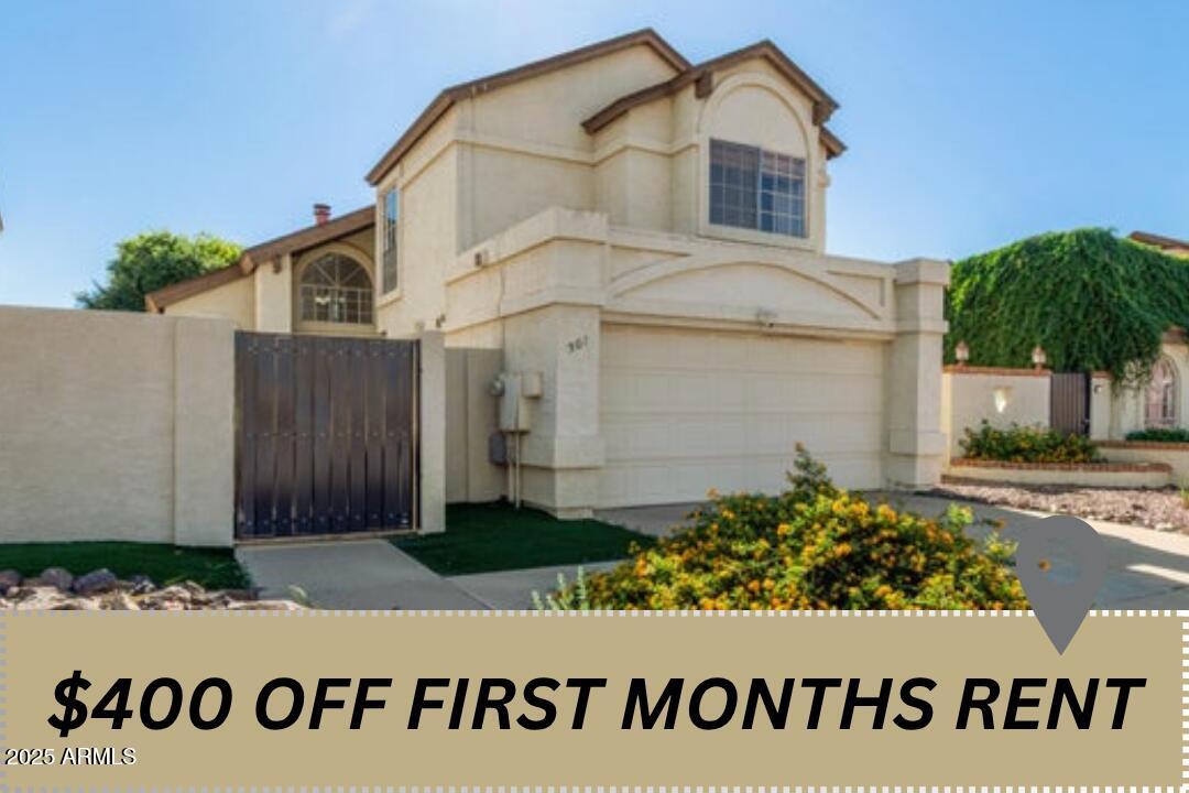 a view of a white house with sign broad