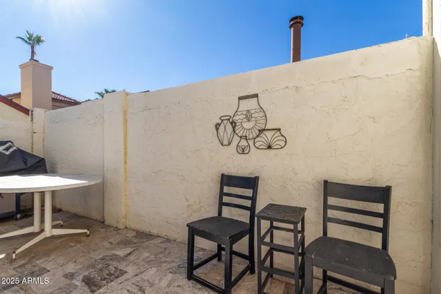 a view of a hallway with seating area