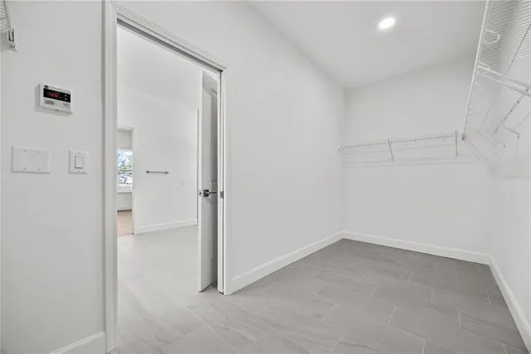 wooden floor and cabinet in an empty room