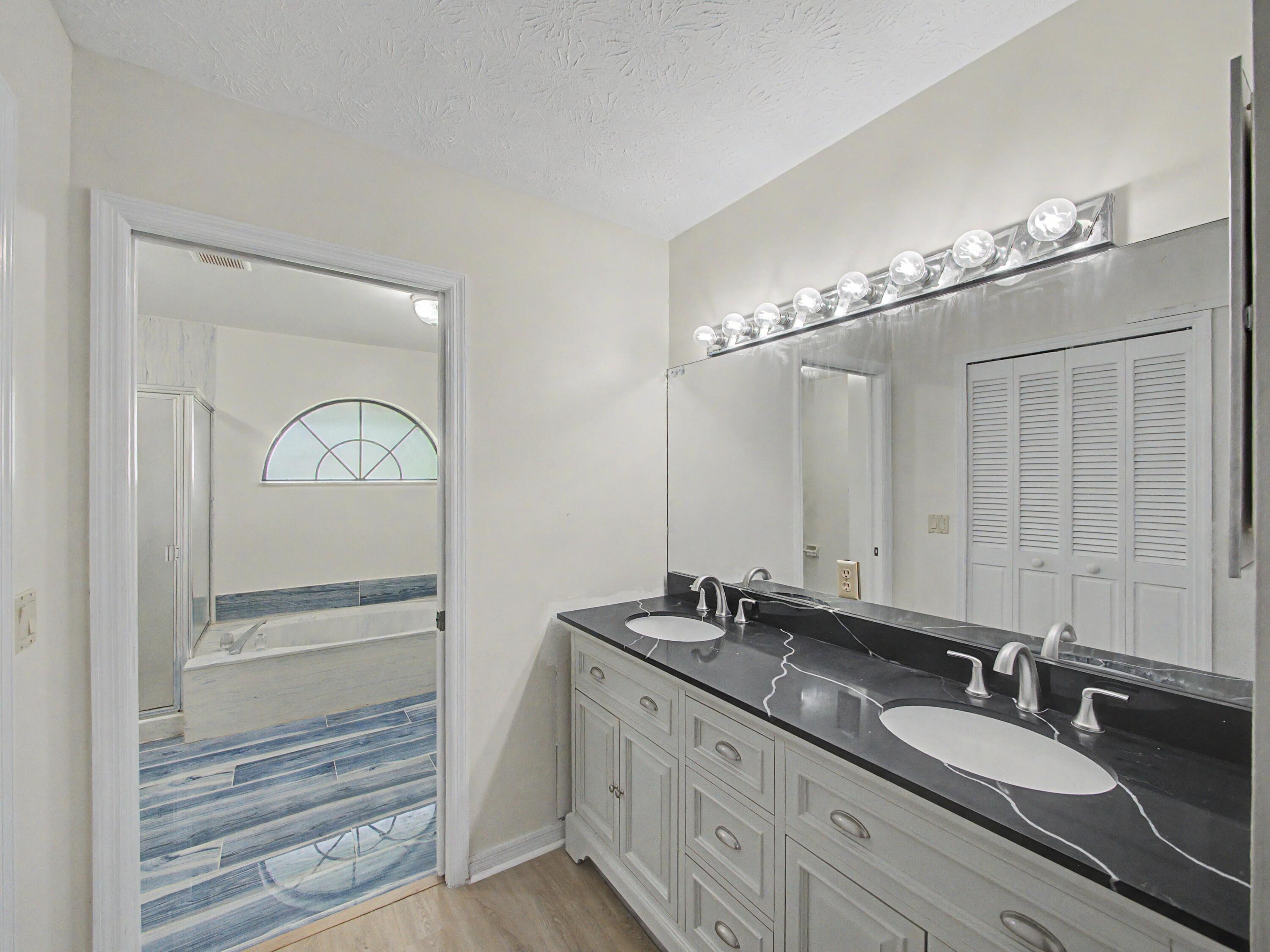 2301 Southwest Abner Road Port St. Lucie, FL 34953 - Photo 8 of 18 Primary Bathroom