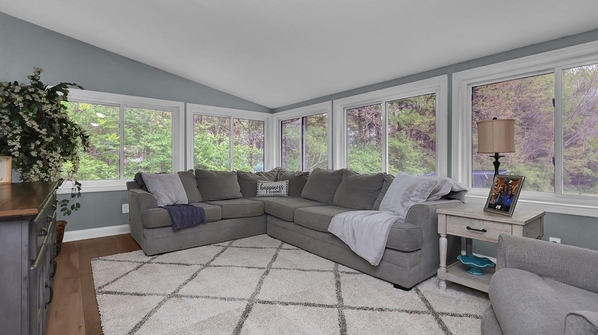 7790 Schott Road Westerville, OH 43081 - Photo 16 of 50 Spanning almost the entire rear of the home is a GREAT room! With views of the backyard and pool, you'll enjoy spending your days in this space FULL of light!