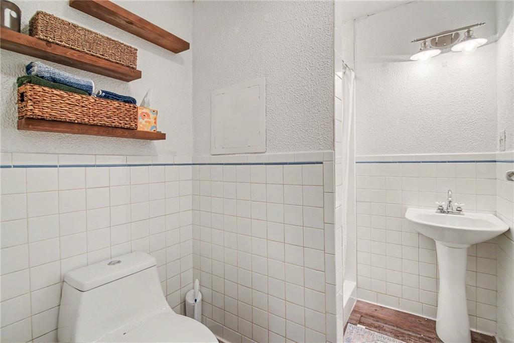330 Butler Road Saxonburg, PA 16056 - Photo 20 of 28 a bathroom with a sink a toilet and shower