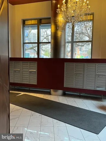 a view of a hallway with staircase